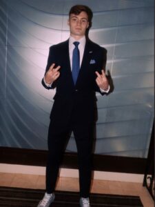 PHOTO Christian Braun Lookin Like 1980's Wall Street Yuppie Who Just Made First Cold Call Sale