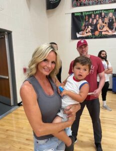 PHOTO Christian Braun's Mom Lisa Looking Hot Holding Toddlers