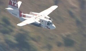 PHOTO Helicopter And Plane From CAL Fire Dropping On Hesperia Fire Look Tiny In Comparison To The Size Of The Fire