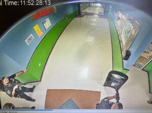 PHOTO Interior View Of Robb Elementary Where Police Officers Are Seen With Rifles Drawn And Ballistic Shields In Hallway At 1152 AM Local Time