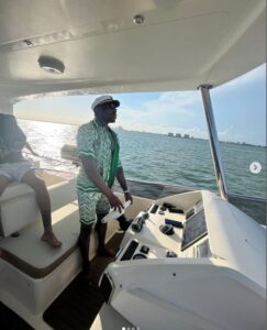 PHOTO Jeff Gladney Driving A Boat On The Water In Miami