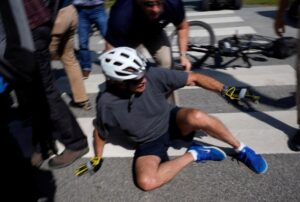 PHOTO Joe Biden Looking Around Like Did Anyone Notice I Just Fell Off My Bike