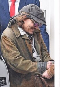 PHOTO Johnny Depp Laughing At Something About Amber Heard A Fan Showed Him On Their Phone