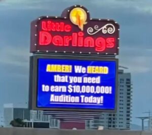 PHOTO Little Darlings Club In Las Vegas Put Amber We Heard That You Need To Earn $100K Audition Today On Their Sign