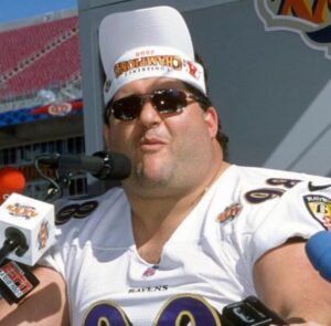 PHOTO Tony Siragusa Wearing An AFC Championship Hat Upside Down Because He Was A Very Light Hearted Guy