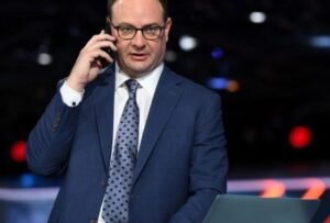 PHOTO Woj On The Phone With NBA Sources In His Basement