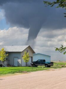 PHOTO Beautiful Tornado On The Ground Behind Barn in Stratton Colorado