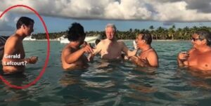 PHOTO Bill Clinton Swimming In The Ocean On Jeffrey Epstein's Island With Gerald Lefcourt