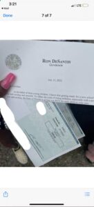 PHOTO Close Up Of $450 Checks Ron DeSantis Sent Out To Florida Residents