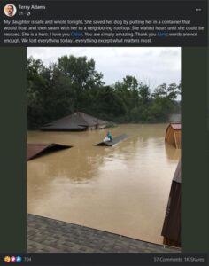 PHOTO Flooding Is So Bad In Southeastern Kentucky One Girl Saved Her And Her Families Dog By Swimming To The Base Of The Roof