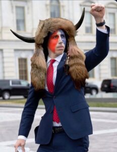 PHOTO Josh Hawley Wearing Horns With Red And Blue Facepaint Outside The Capitol Meme