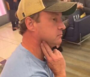 PHOTO Lane Kiffin Checking His Pulse In A Shopping Mall After His Daughter Used His Credit Card To Buy $700 Worth Of Merchandise At A Store Nobody Has Heard Of