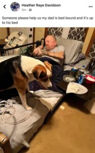 PHOTO Man In Eastern Kentucky Is Bed Bound Due To Health Conditions And The Flood Waters Were Up To His Bed With His Dog By His Side