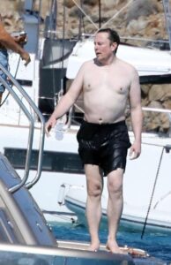 PHOTO Of Elon Musk Sunbathing On Yacht In Swimsuit And Boy Is He Fat