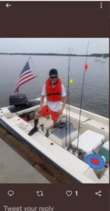 PHOTO Robert Crimo On A Boat Out At Sea With An American Flag And Safety Vest