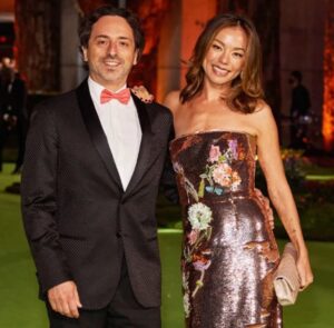 PHOTO Sergey Brin's Wife Is Eye Candy With $10K Purse And Strapless Dress