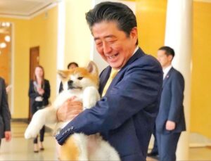 PHOTO Shinzo Abe Holding The Dogecoin Dog