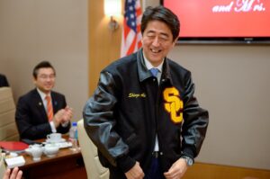 PHOTO Shinzo Abe Wearing A Custom USC Jacket With His Name On It