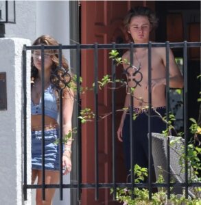 PHOTO Anne Heche's Son Leading His Two Girlfriends Out Of House Shirtless