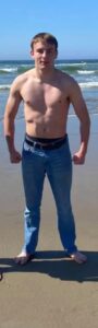 PHOTO Bend Oregon Shooter Ethan Miller Flexing At The Beach Shirtless Trying To Look As Buff As Possible