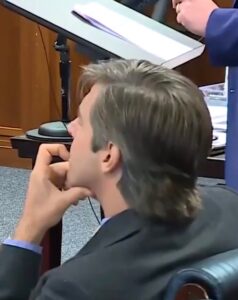 PHOTO Close Up Of Alex Jones' Lawyer Chewing On His Fingernails Not Caring What Happens To Alex In His Trial