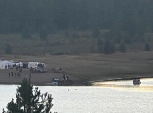 PHOTO Close Up Of Kiely Rodni's White SUV Still Intact Sitting On Grassy Area Next To Prosser Lake