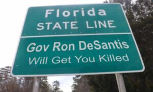 PHOTO Florida State Line Governor Ron DeSantis Will Get You Killed Sign Meme