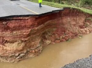 PHOTO Giant Piece Of Road Missing From Flooding So It Looks Like The End Of The World In Jackson Mississippi