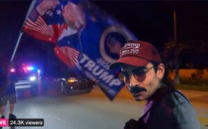 PHOTO Hank Pecker On Streets Outside With Trump 2024 Flag Blocking The Road To Protect Mar-A-Lago