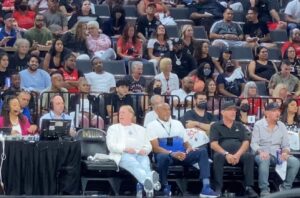 PHOTO Mark Davis Sitting Next To Social Activist Tommie Smith At LV Aces Playoff Game 1