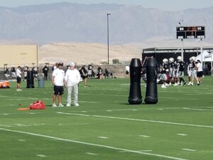 PHOTO Mark Davis Talking To Dave Ziegler During Raiders Practice