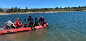 PHOTO Of Dive Teams Searching Murky Water For Kiely Rodni