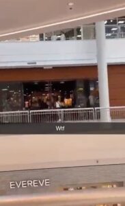 PHOTO Of Gunman Walking Casually Into Nike Store And Opening Fire