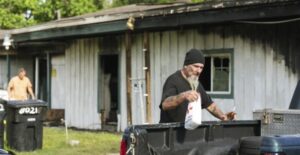 PHOTO Of Houston Gunman Taking Items From The Bed Of His Truck Before Opening Fire At Apartment Complex