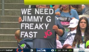 PHOTO Seahawks Fan So Upset His Team Lost Russell Wilson He's Holding A We Need Jimmy G Sign At Preseason Game