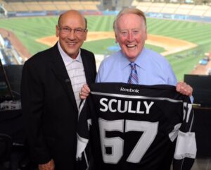 PHOTO Vin Scully Holding His Very Own Custom LA Kings Hockey Jersey At Dodger Stadium