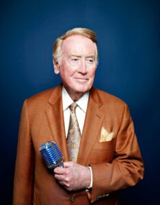 PHOTO Vin Scully Wearing A Signature Brown Colored Suit With Signature Blue Old School Microphone