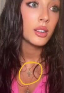 PHOTO Adam Levine's Mistress Wearing A Necklace With With A Cross On It Across Her Neck