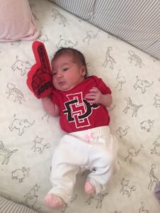 PHOTO Gavin Escobar Dressed Up His Newborn Baby That Was Born In 2015 With Red San Diego State Actecs Apparel And Foam Finger