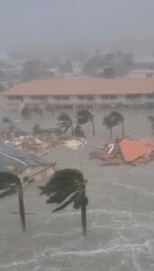 PHOTO Homes Completely Flattened And Destroyed Down To The Foundation In Fort Myers Beach All That's Left Is Piles Of Wood Debris