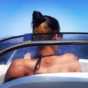 PHOTO Ime Udoka's Mistress On A Boat Out At Sea And You Can See Her Tattoo Of A Cross On Her Back