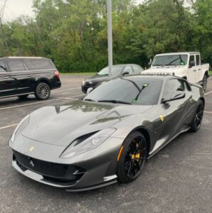 PHOTO Of Patrick Mahomes' 2020 Silver Ferrari 812 Superfast Sitting In Chiefs Training Facility Parking Lot