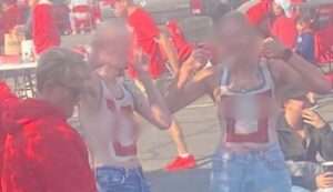 PHOTO Of Two Hot Chicks Wearing Body Paint At Utah Utes Tailgate Party Before Going Into Stadium