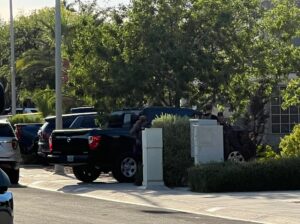 PHOTO Of Unmarked Police Vehicles Outside Of Robert Telles' House Before He Was Arrested On Suspicion Of Murder