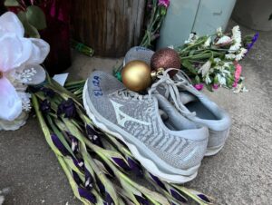 PHOTO Pair Of Running Shoes Left At Eliza Fletcher's Abduction Site To Honor Her