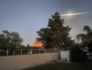 PHOTO Resident In Hemet California Can See The Fire Up On A Hill Less Than 100 Feet From Their Backyard