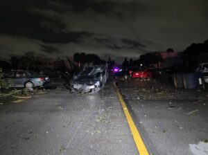 PHOTO Wood Foundation From Buildings Laying All Over Smashed Cars On Roads At Kings Point In Delray Beach Like It's A Bad Movie