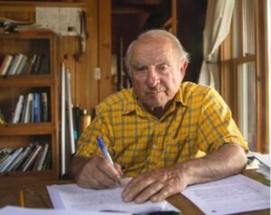 PHOTO Yvon Chouinard Signing His Company Away To A Nonprofit From His Little Log Cabin