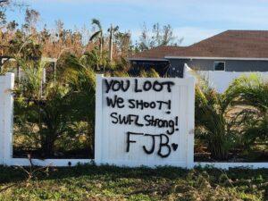 PHOTO House In SWFL With A Sign That Says You Loot We Shoot SWFL Strong FJB