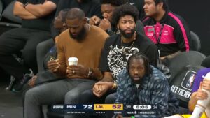 PHOTO Lebron James Sipping Tea Out Of A Paper Coffee Cup During Wolves Lakers Preseason Game In Vegas